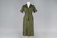 Image of Green skirt suit with gold stripes, ca. 1950